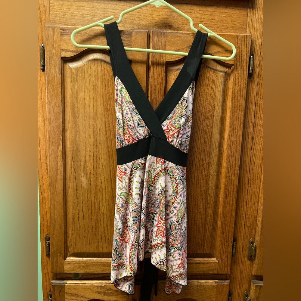 Tempted ladies, sleeveless top.